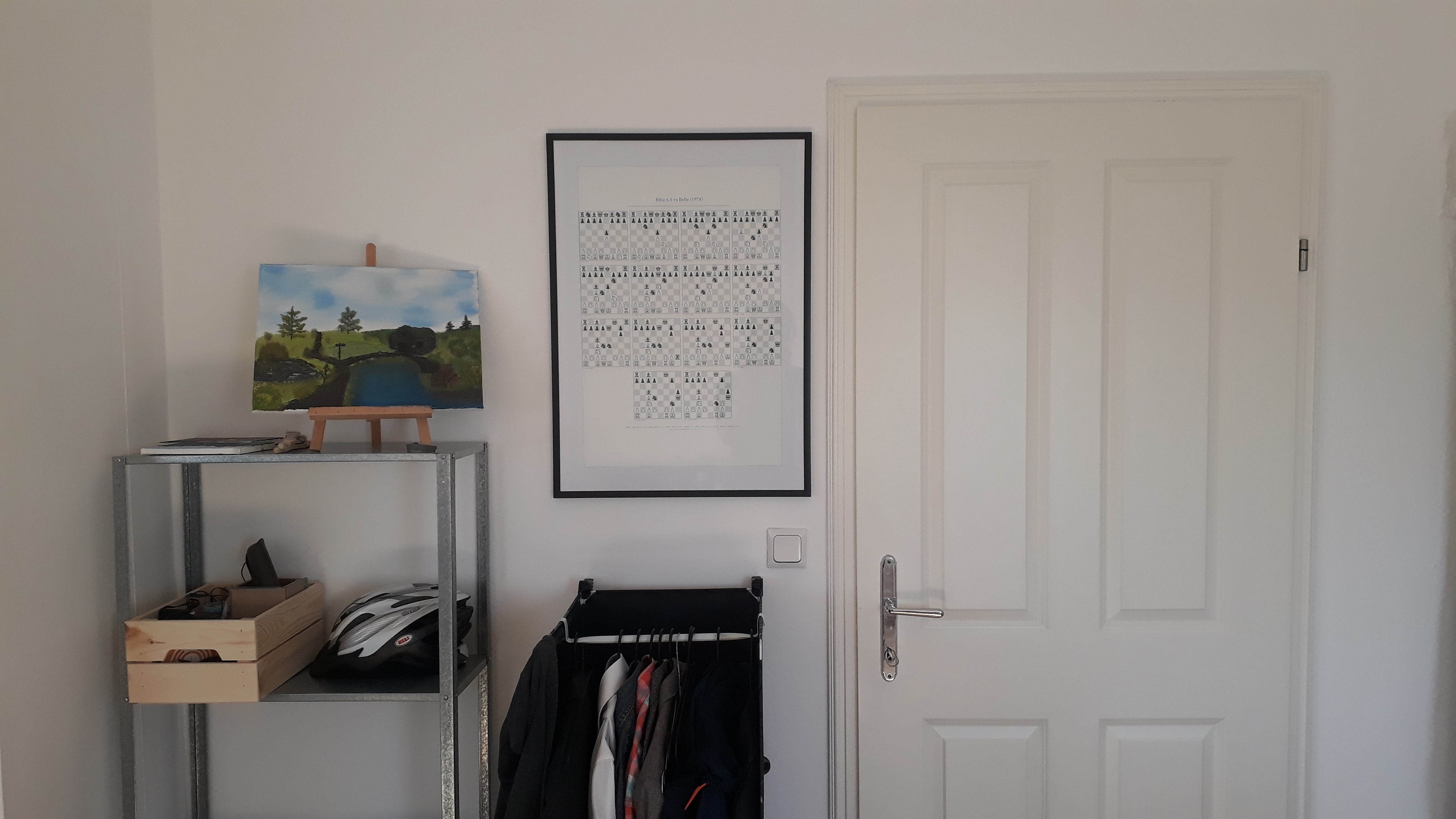 The framed poster seen from further away